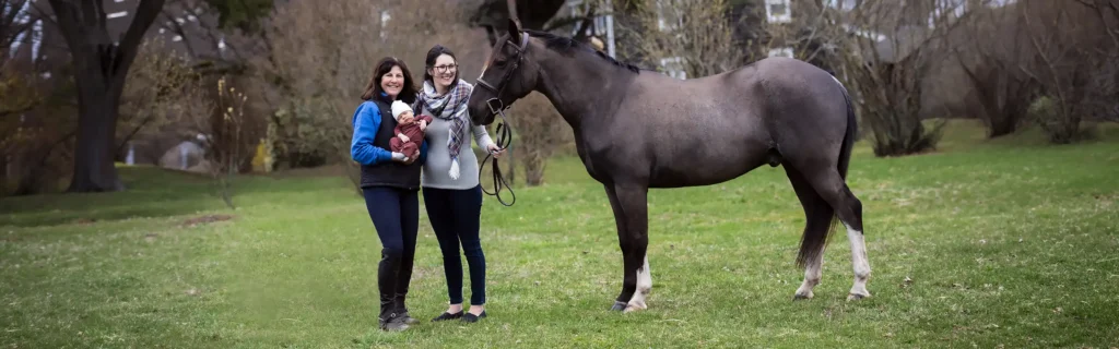 Grandmother, Mom, Baby And A Horse