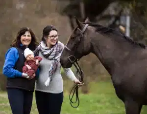 Grandmother, Mom, Baby And A Horse